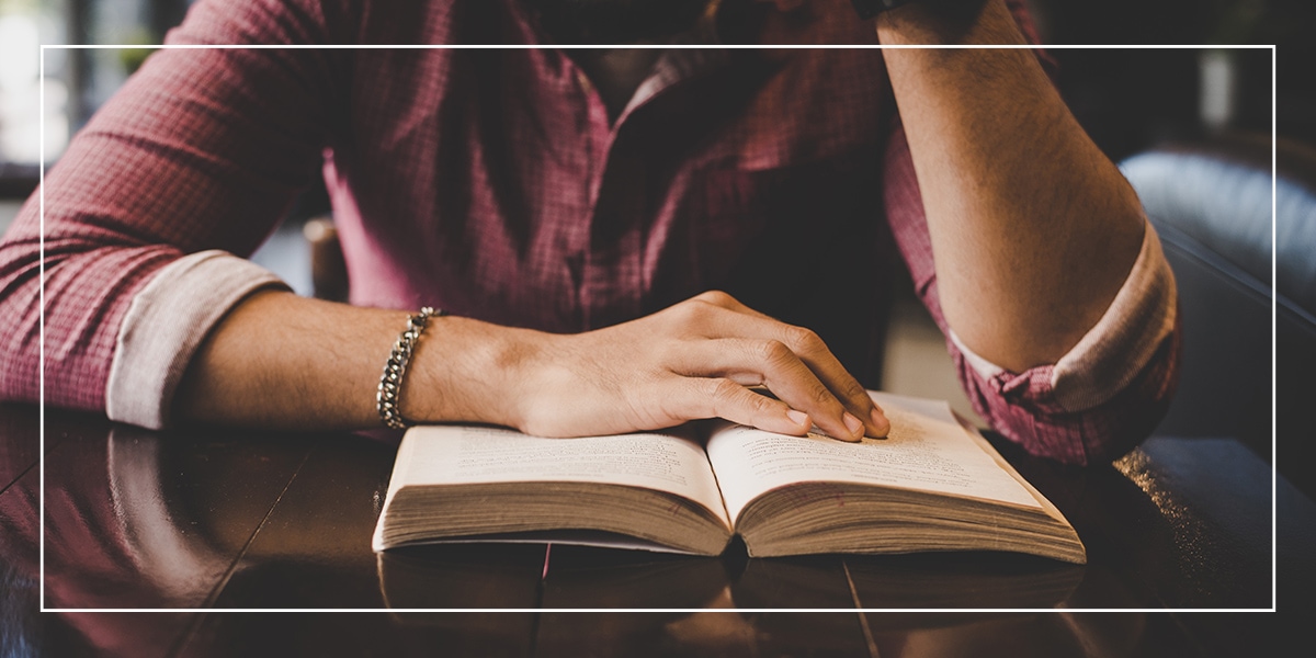 Three20-Recovery-Community_Northwest-Indiana-Recovery_Programs_Faith Reading the Bible as they attend the faith program at Three20 Recovery