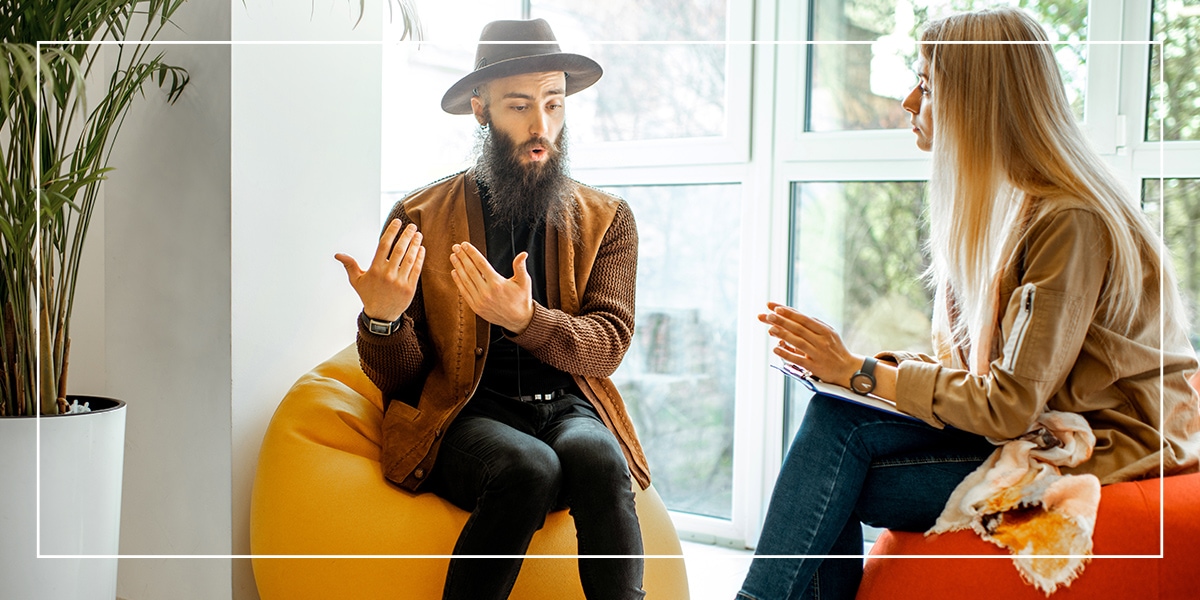 Three20-Recovery-Community_Northwest-Indiana-Recovery_Services_Recovery-Coaching A recovery coach talking with a Three20 Recovery member