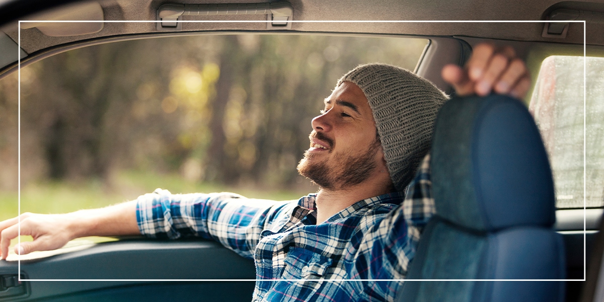 Three20-Recovery-Community_Northwest-Indiana-Recovery_Services_Rideshare-Transit A man enjoying a drive with Rideshare Transit